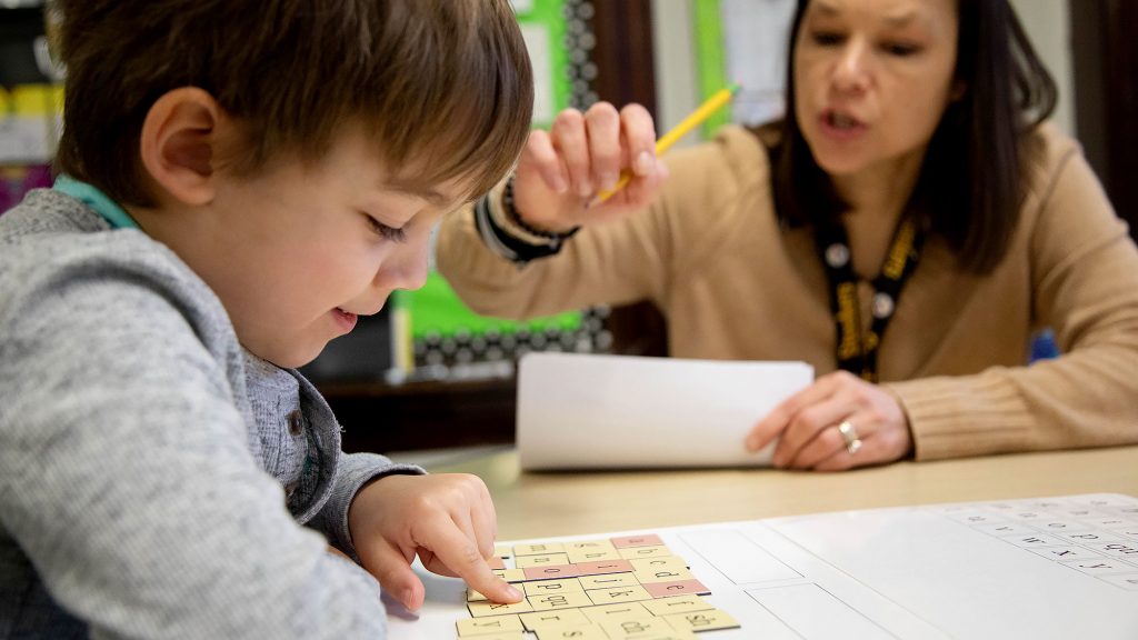 MEd in Reading Specialist tutoring a small student