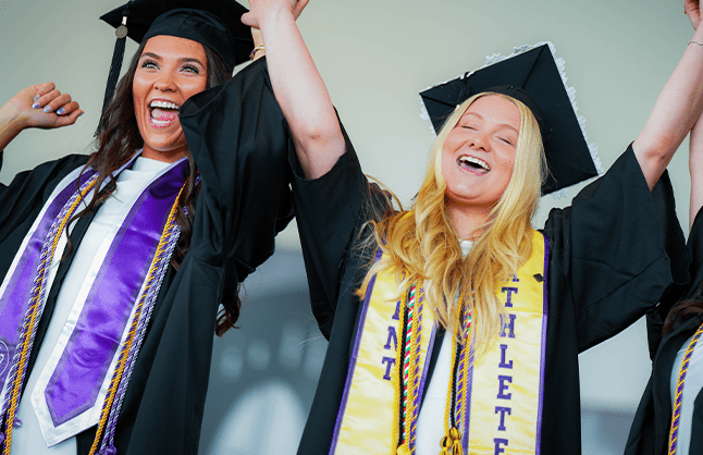 Carlow graduates celebrating at commencement