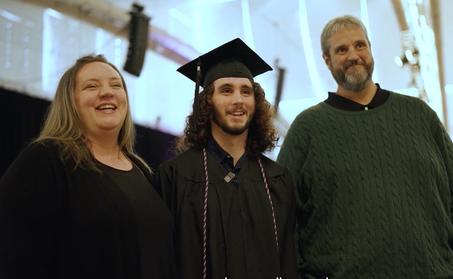 Alex and family at commencement