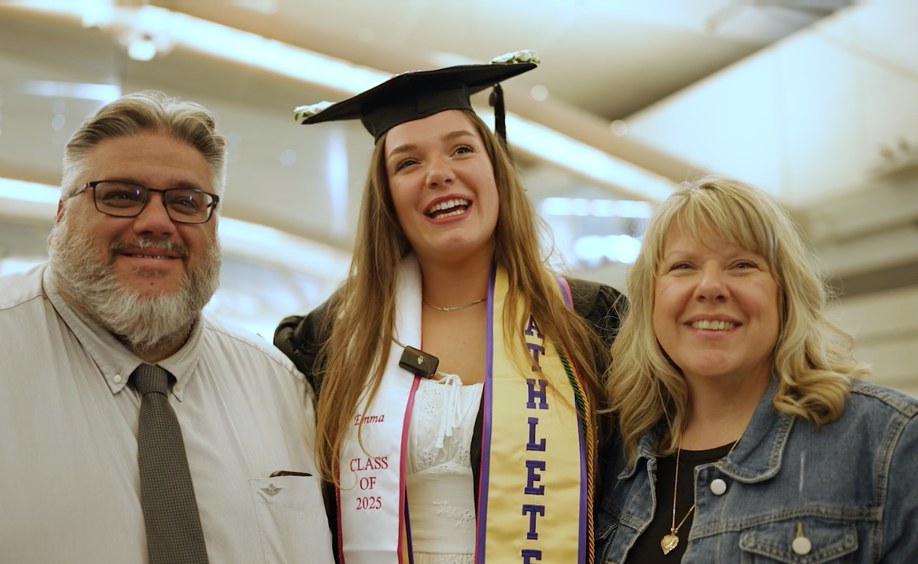 Emma and family at commencement