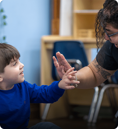 A Carlow education student working with a young child
