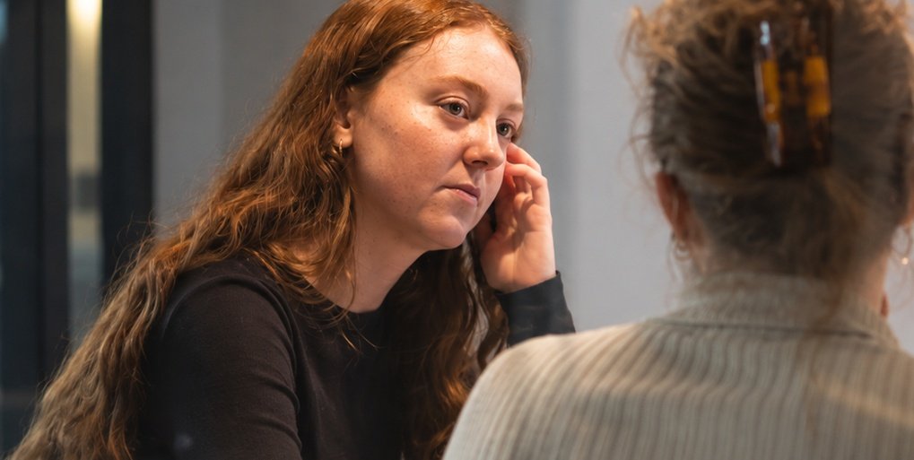 Two people in conversation