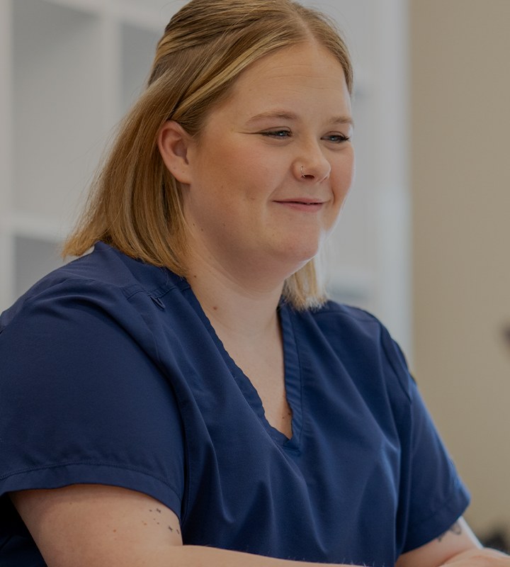 A Carlow nursing student smiling in class